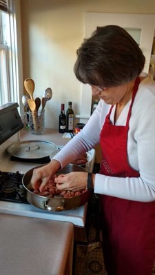 Parmesan Polenta with Sausage Ragu cooking