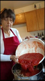 pouring in the tomatoes